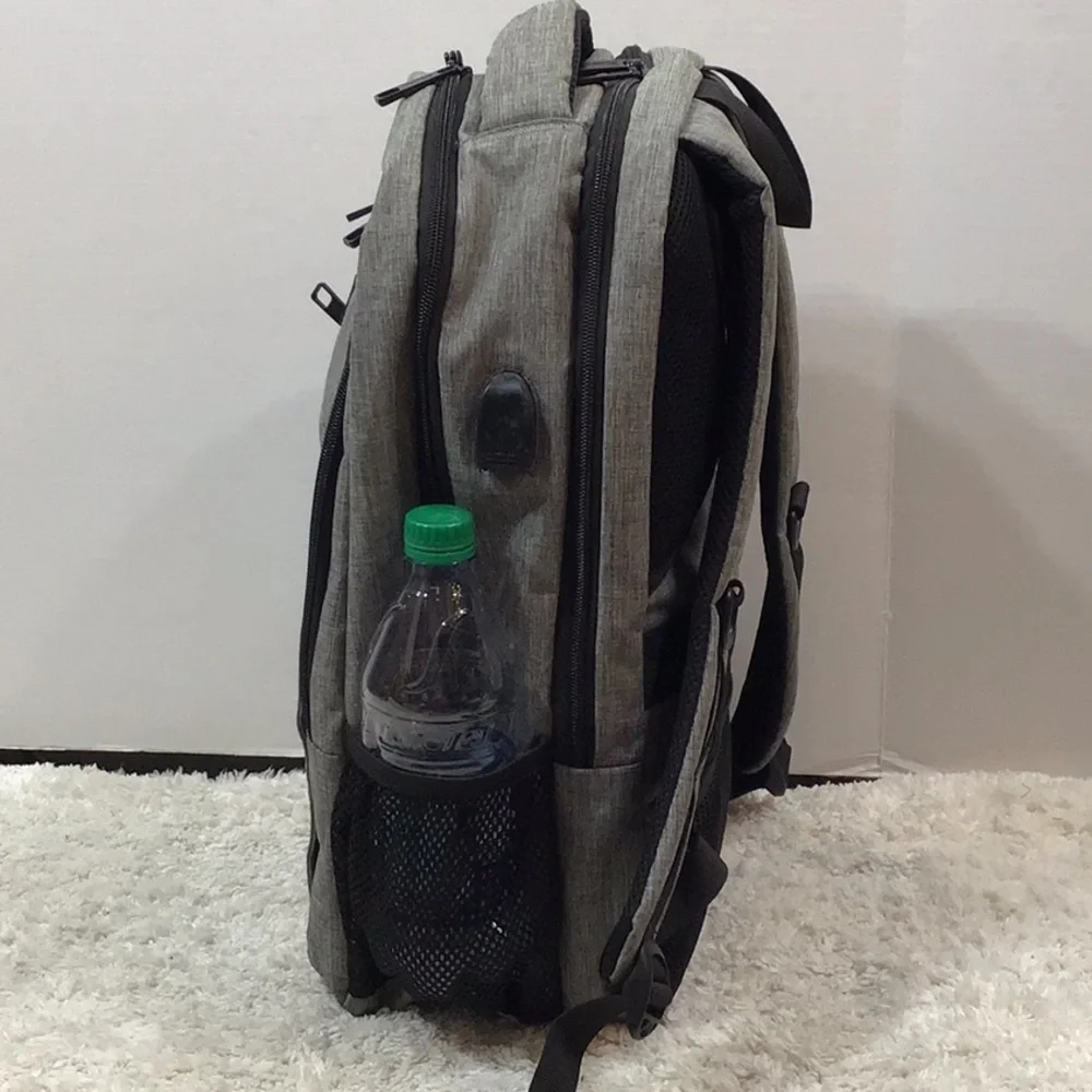 Matein gray fabric multi pocket backpack NWOT